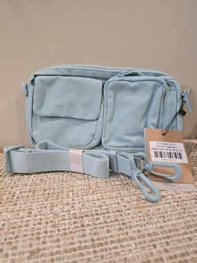 Light Blue Crossbody Organizer Bag with Dual Front Pockets